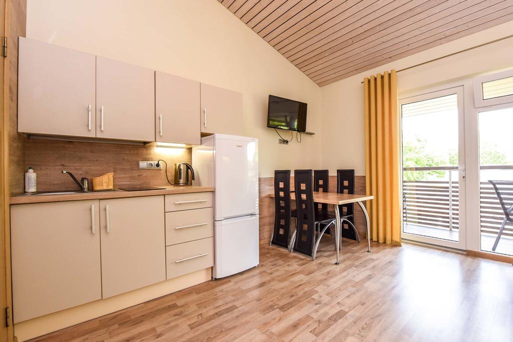 Apartamentai Trys Pusys Швентой Экстерьер фото